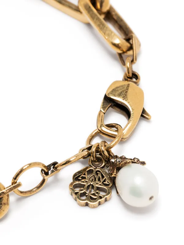Alexander McQueen pearl embellished Skull Bracelet Farfetch