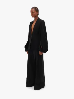 Pantaloni palazzo plissettati in nero | JW Anderson