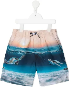 speedo guys at beach