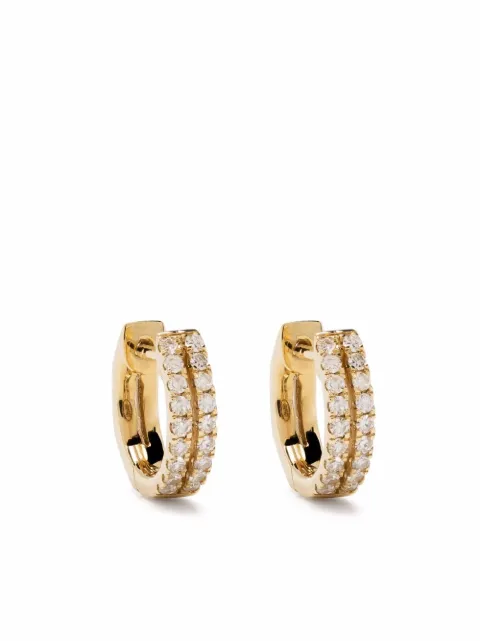Djula aretes huggie en oro amarillo de 18kt con diamantes