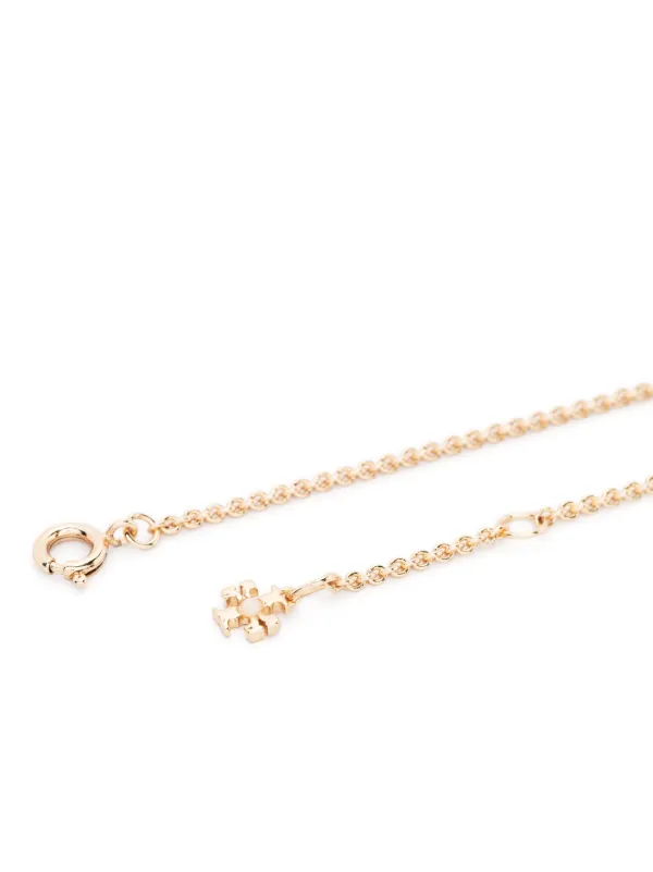 Tory Burch Miller cut-out Logo Bracelet | Gold | FARFETCH