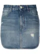 Image 1 of The Attico distressed denim mini skirt