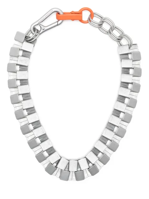 Click to view more detailed imagery on our partner's website Heron Preston Geometric Cubic Necklace In Metallic