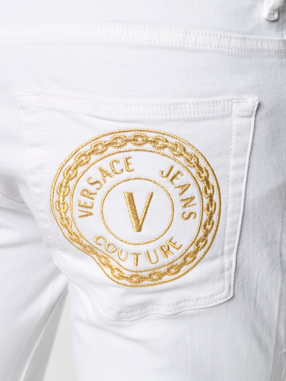 фото Versace jeans couture джинсы кроя слим с вышитым логотипом