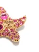 Versace broche de estrella con detalle de cristales