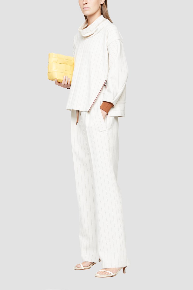 Odita Lattice Pouch-yellow #1 Odita Lattice Pouch, Going somewhere? Make sure to take with you this sunshine-yellow Odita calf leather clutch bag from 3.1 Phillip Lim then. It won't fail you no matter where you're going. Featuring woven leather effect, a top zip closure, a chain link strap and a main internal compartment. - 1