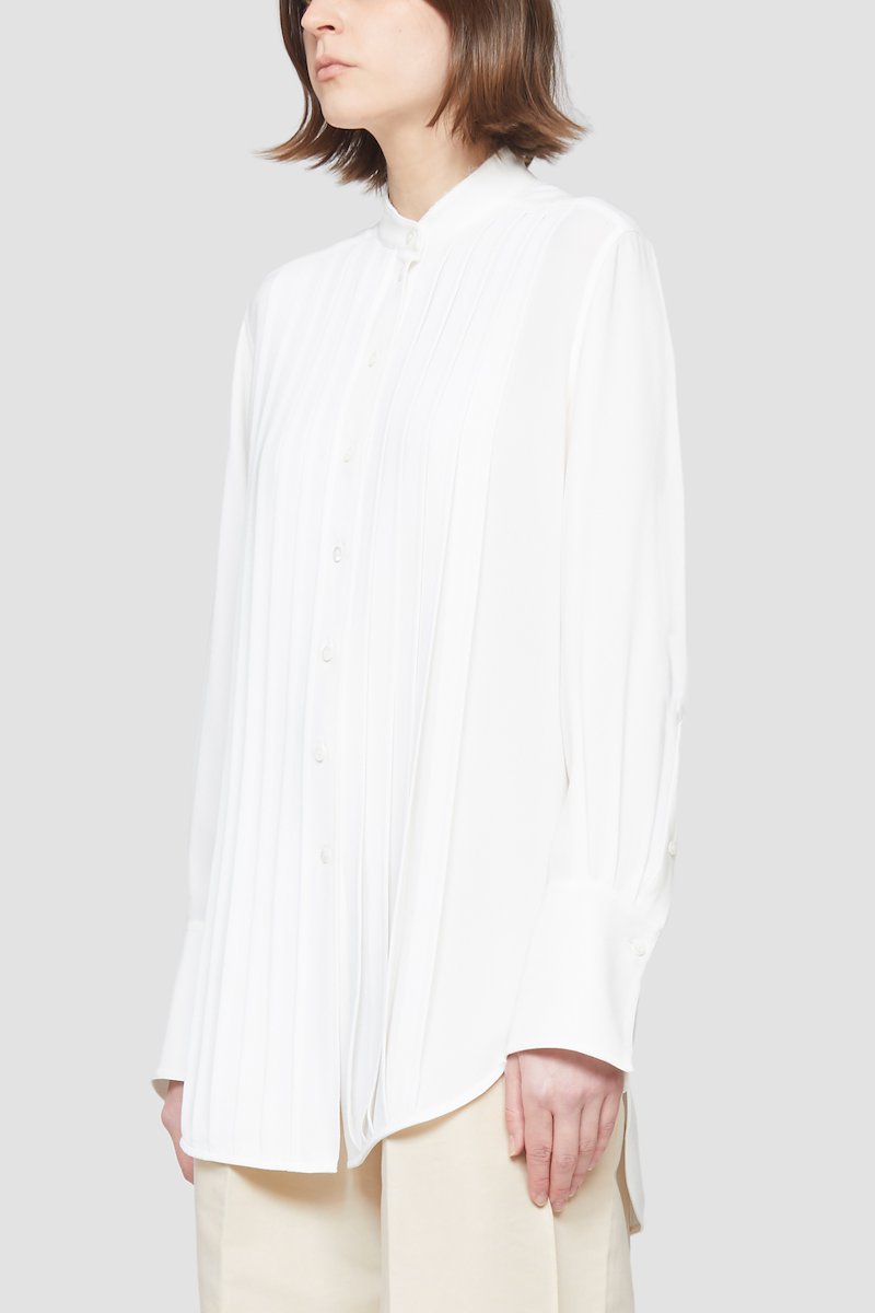 Pleated Button Down Shirt-white #1 Pleated Button Down Shirt, Ivory white pleated-panel button-up shirt from 3.1 PHILLIP LIM featuring pleat detailing, band collar, front button fastening, long sleeves, buttoned cuffs and curved hem.- 3
