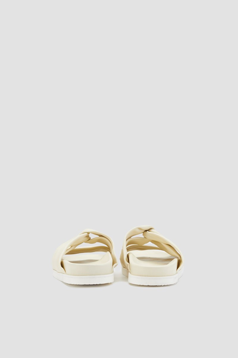 Twisted Pool Slide-neutrals #0 Twisted Pool Slide, Vanilla nude calf leather twist-detail leather slides from 3.1 PHILLIP LIM featuring leather lining, twist detailing, open toe, slip-on style, branded insole and flat rubber sole.- 4