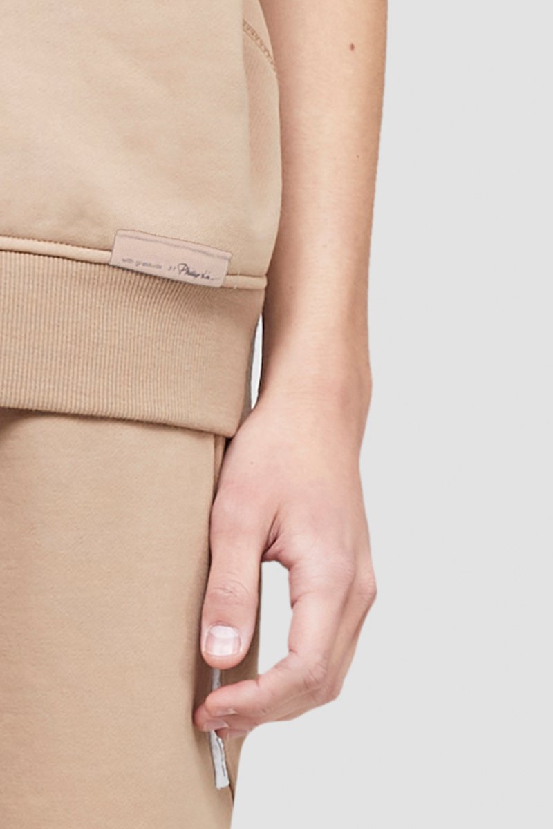 The Everyday Short Sleeve Crew Sweatshirt-neutrals #0 The Everyday Short Sleeve Crew Sweatshirt, Camel brown cotton logo patch detail T-shirt from 3.1 PHILLIP LIM featuring logo patch to the front, ribbed detailing, rolled cuffs, crew neck, short sleeves and straight hem.- 4
