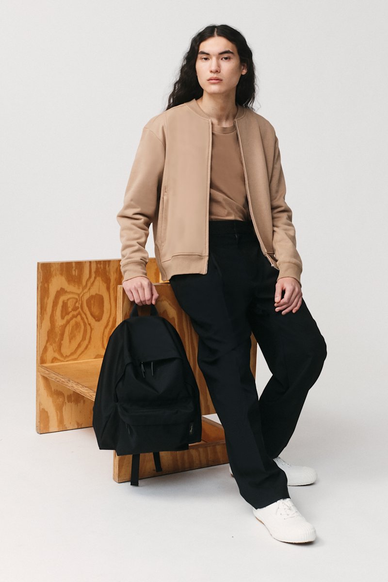 The Everyday Bomber-black #1 The Everyday Bomber, Black cotton zipped-up bomber jacket from 3.1 PHILLIP LIM featuring ribbed detailing, logo patch to the front, band collar, front zip fastening, long sleeves and two side welt pockets.- 1