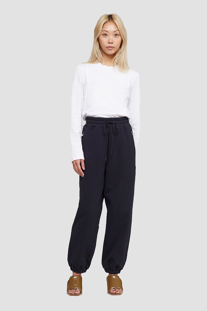 The Everyday Sweatpant-black #0 The Everyday Sweatpant, Black cotton drawstring-waist track pants from 3.1 PHILLIP LIM featuring jersey fleece, logo patch to the side, elasticated ankles, elasticated drawstring waistband and two side zip-fastening pockets.- 0
