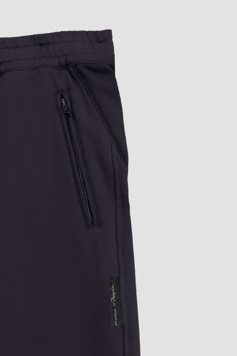 The Everyday Sweatpant-black #0 The Everyday Sweatpant, Black cotton drawstring-waist track pants from 3.1 PHILLIP LIM featuring jersey fleece, logo patch to the side, elasticated ankles, elasticated drawstring waistband and two side zip-fastening pockets.- 8