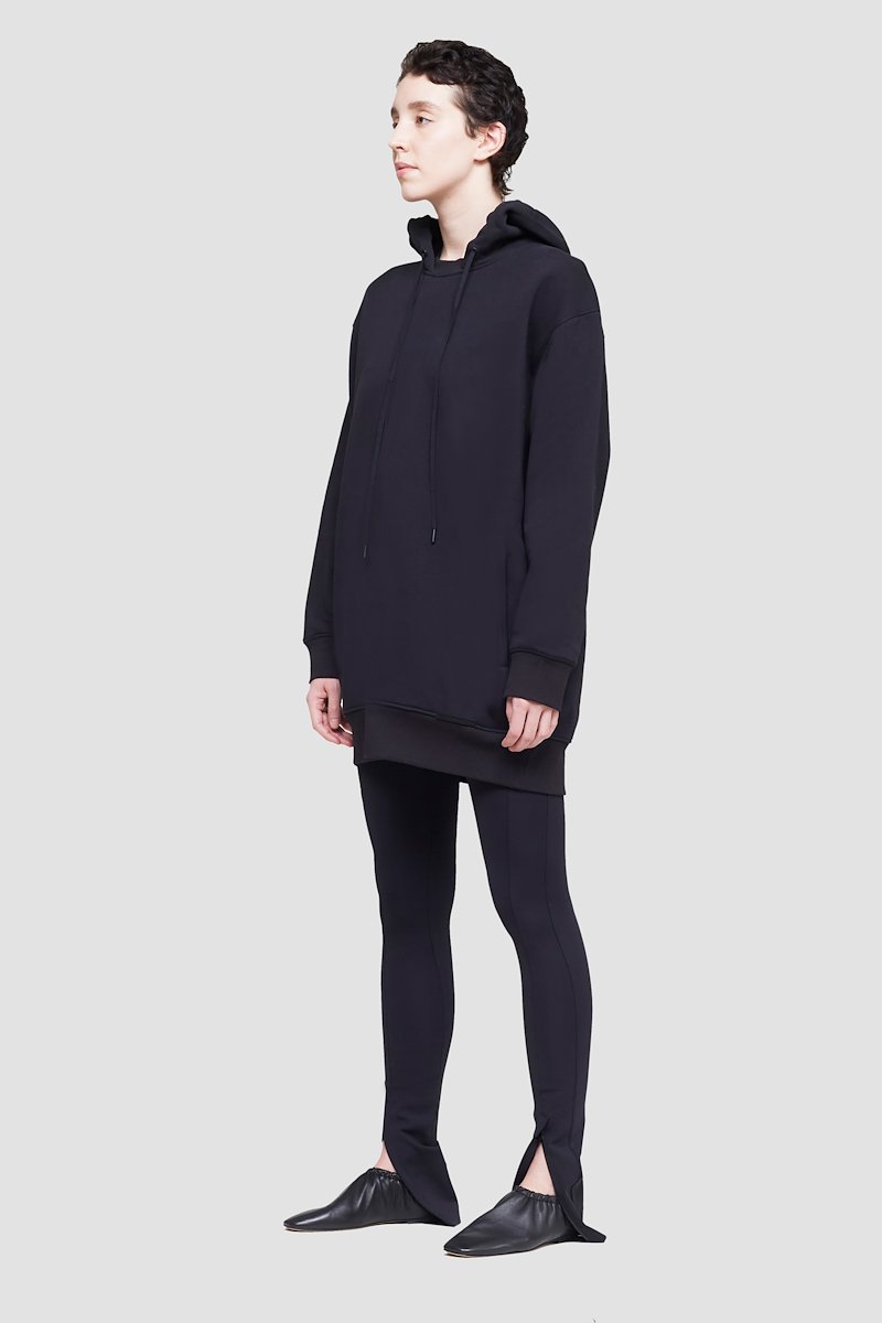 The Live-In Sweat Dress-black #0 The Live-In Sweat Dress, Black cotton drawstring-hood sweatshirt dress from 3.1 PHILLIP LIM featuring jersey fleece, logo patch to the front, ribbed detailing, drawstring hood, long sleeves and side two-way zip fastening.- 2