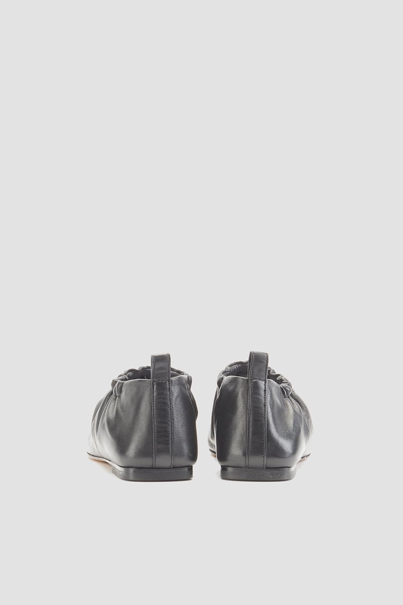 Ruched Slipper-black #0 Ruched Slipper, Did you know that in the16th century, mules were bedroom or boudoir slippers worn inside and not out in public? Can you imagine not being allowed to show this 3.1 Phillip Lim silver-tone pair to everyone? Glad fashion evolved, right? Featuring a ruched detail, a pull tab at the rear, a square toe, an elasticated fastening and a flat leather sole.- 2