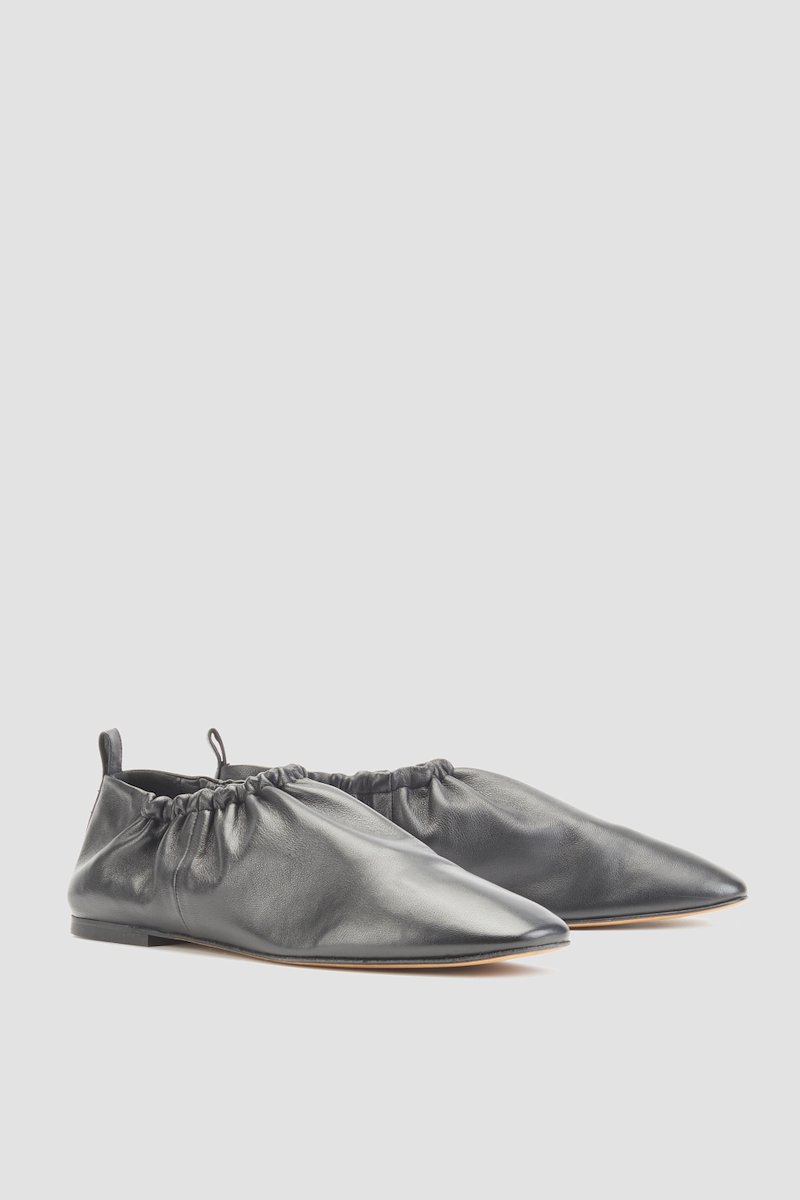 Ruched Slipper-black #1 Ruched Slipper, Did you know that in the16th century, mules were bedroom or boudoir slippers worn inside and not out in public? Can you imagine not being allowed to show this 3.1 Phillip Lim silver-tone pair to everyone? Glad fashion evolved, right? Featuring a ruched detail, a pull tab at the rear, a square toe, an elasticated fastening and a flat leather sole.- 1