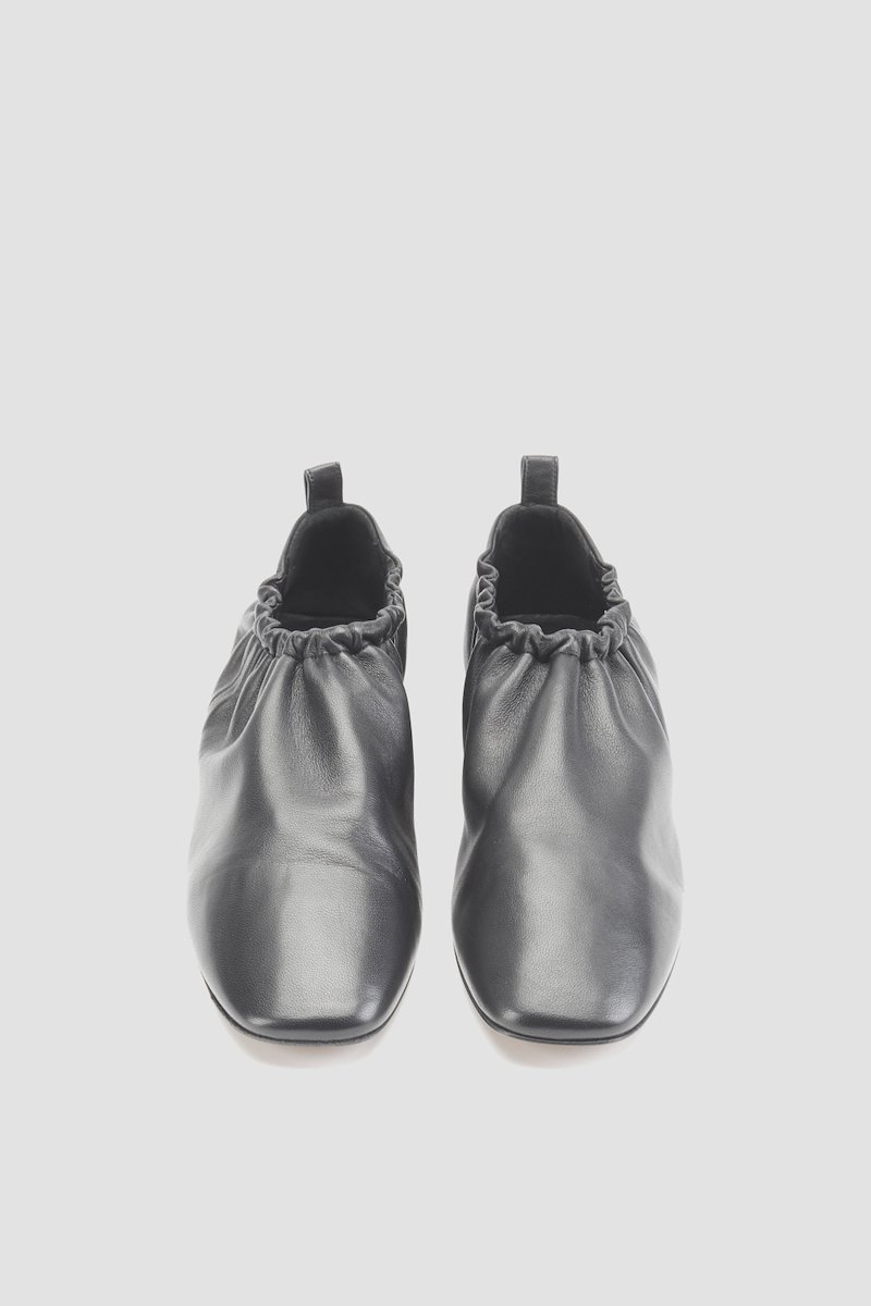 Ruched Slipper-black #1 Ruched Slipper, Did you know that in the16th century, mules were bedroom or boudoir slippers worn inside and not out in public? Can you imagine not being allowed to show this 3.1 Phillip Lim silver-tone pair to everyone? Glad fashion evolved, right? Featuring a ruched detail, a pull tab at the rear, a square toe, an elasticated fastening and a flat leather sole.- 5
