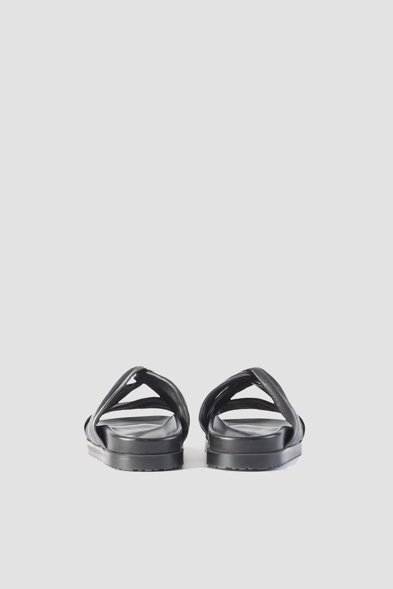Twisted Pool Slide, Black calf leather twist-detail leather slides from 3.1 PHILLIP LIM featuring twist detailing, open toe, slip-on style, branded insole and flat rubber sole.- 4