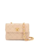 CHANEL Pre-Owned 1990 diamond-quilted mini bag - Pink