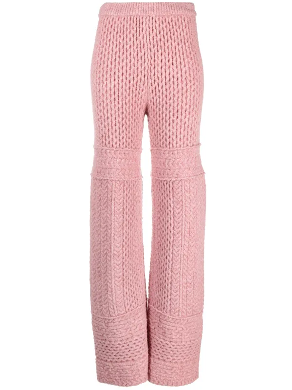Shop Nanushka Fina cable-knit trousers 