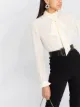 Saint Laurent Blusa com laço na gola e pregas