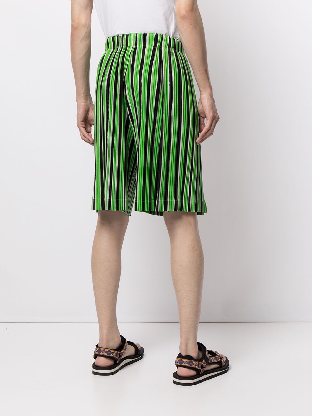 Shop Issey Miyake Striped Plissé Track Shorts In Green