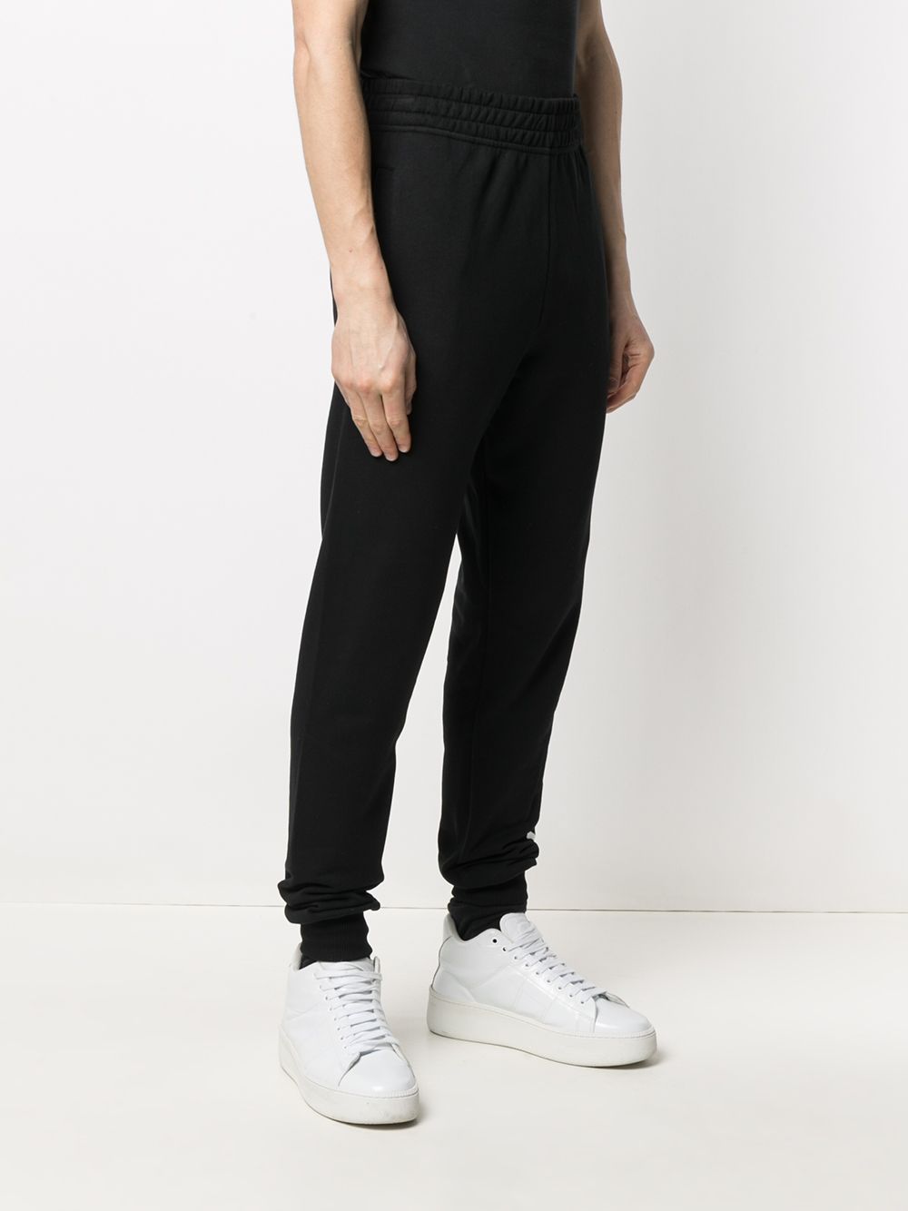 Shop Etudes Studio Logo-print Track Pants In Black