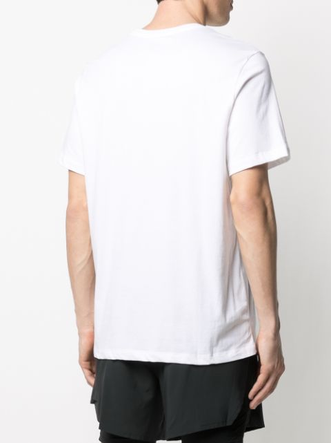 Shop white Nike slogan-print short-sleeved t-shirt with Express ...