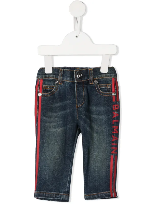 Shop Balmain Kids logo stripe jeans 