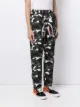 A BATHING APE® camouflage print trousers