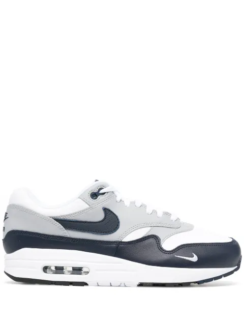 blue and white nike low tops