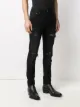 AMIRI distressed skinny jeans