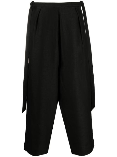 Shop Saint Laurent cropped hakama-pleat trousers with Express Delivery ...