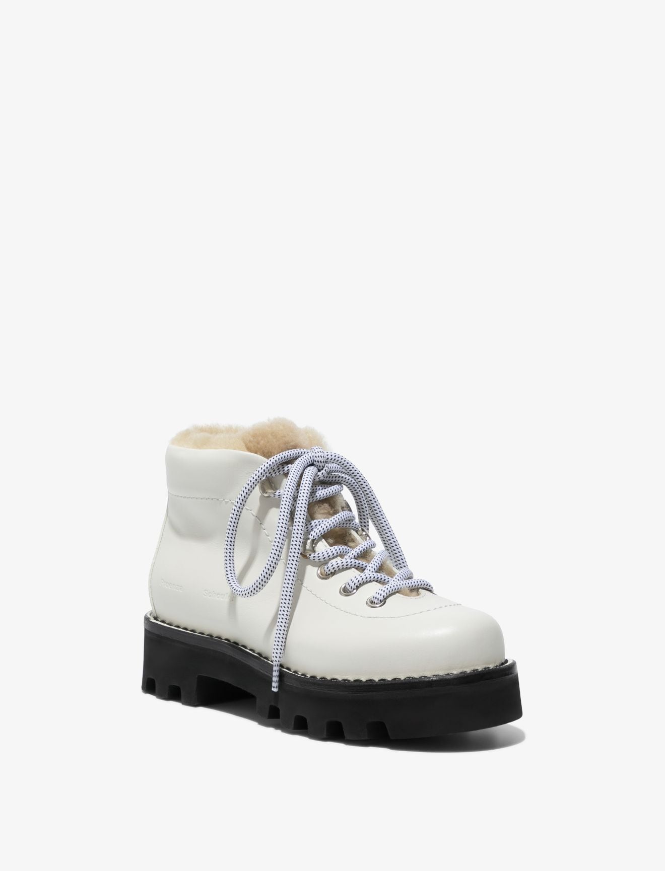 white hiking boots with fur