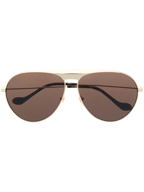 Gucci Eyewear lunettes de soleil GG0908 à logo