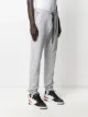 AMIRI paint splatter logo trackpants