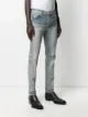 AMIRI distressed skinny jeans