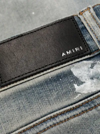 distressed skinny jeans | AMIRI 
