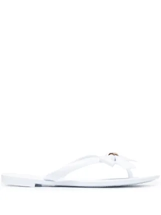 Shop Carvela Star bow-detail flip flops with Express Delivery - FARFETCH