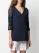 D.Exterior crocheted sleeves knitted top