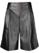 Image 1 of Comme Des Garçons Homme Plus flared faux-leather shorts