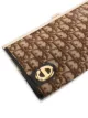 Christian Dior 1970s pre-owned Trotter logo plaque clutch