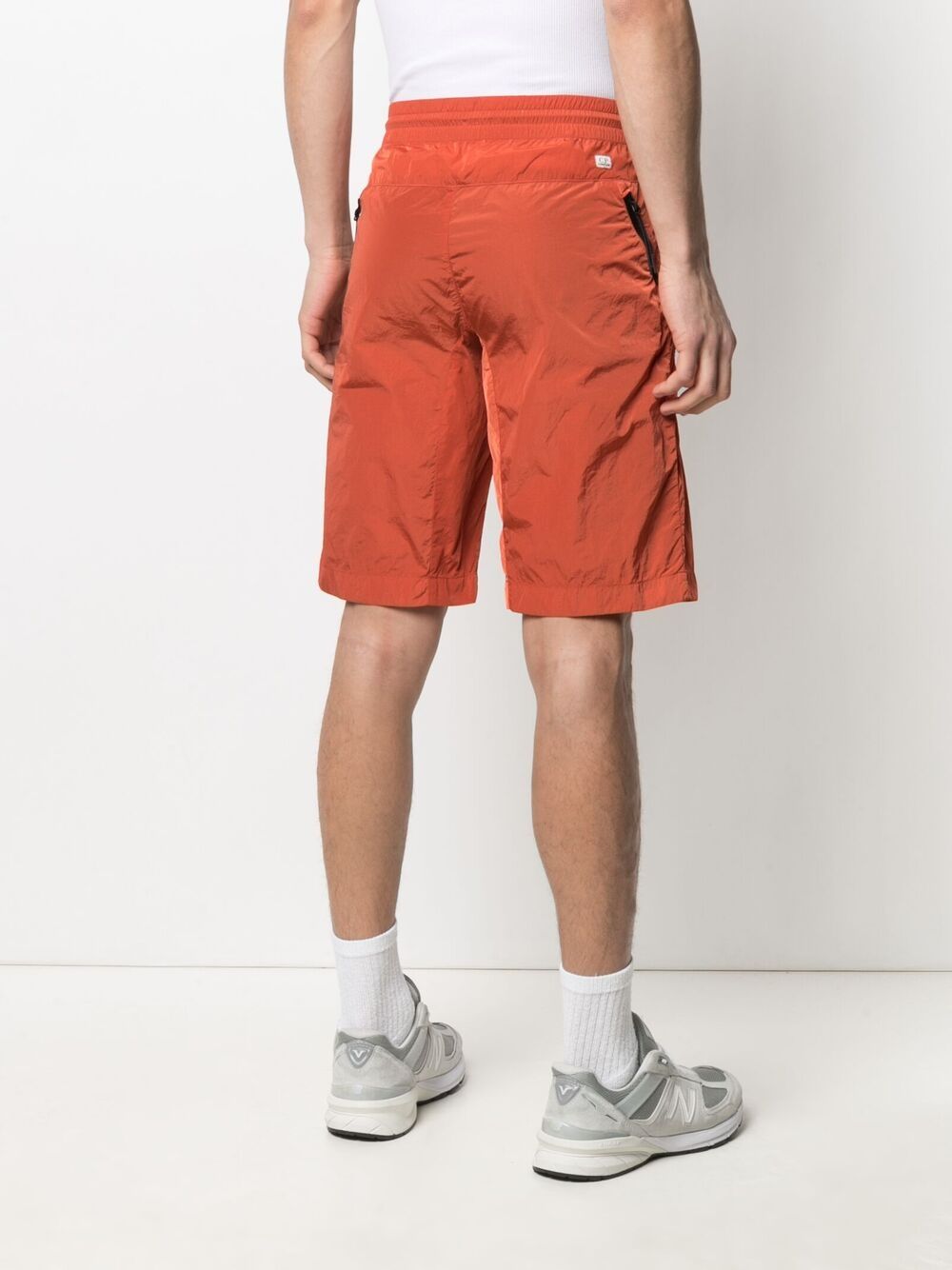 фото C.p. company lens-embellished track shorts