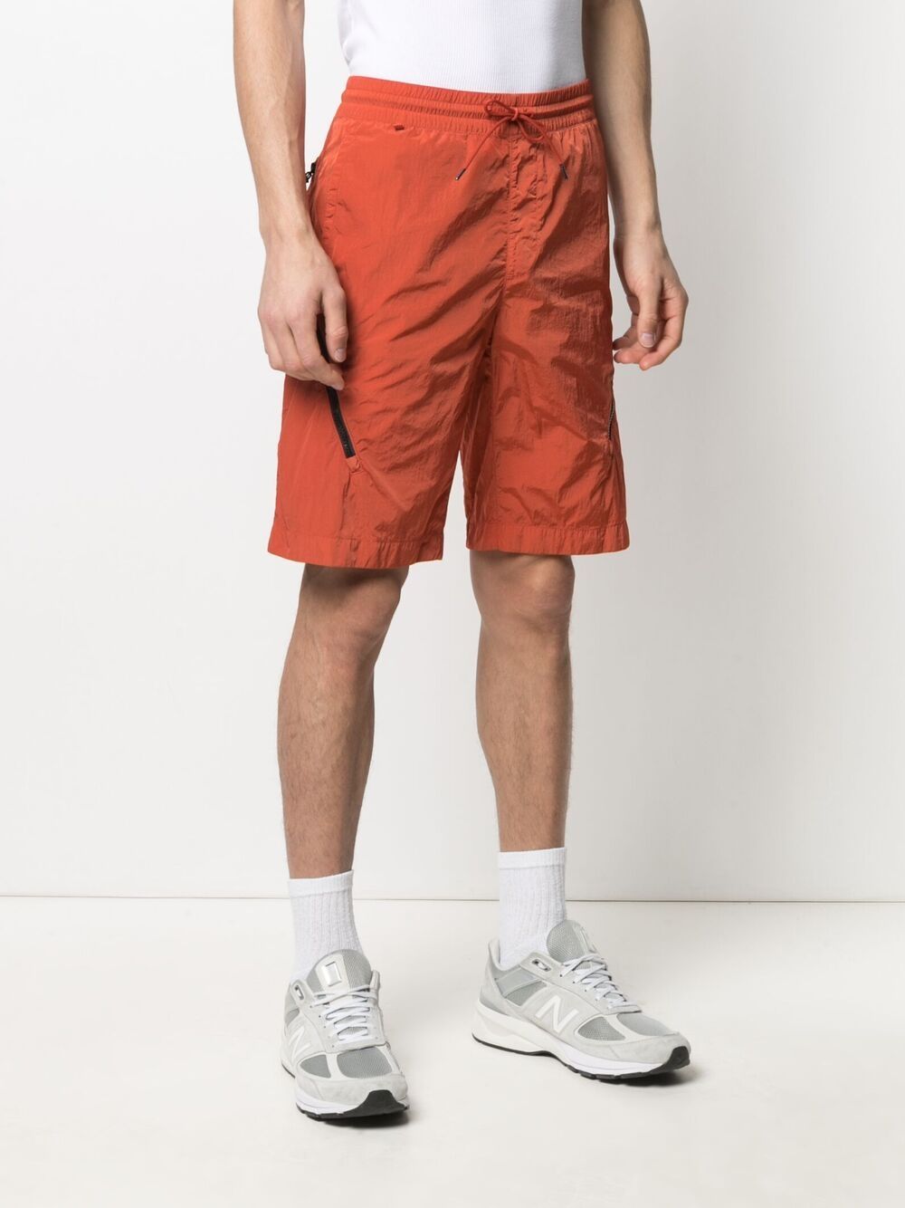 фото C.p. company lens-embellished track shorts