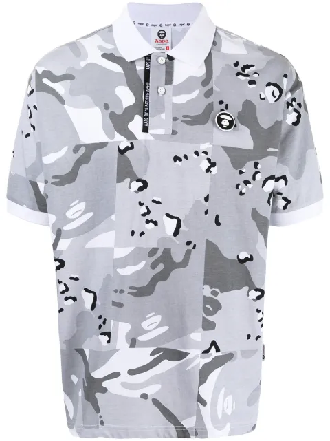 AAPE BY *A BATHING APE® قميص بولو بأكمام قصيرة وطبعة كاموفلاج