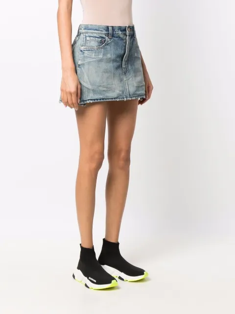 Shop Balenciaga distressed denim skirt 