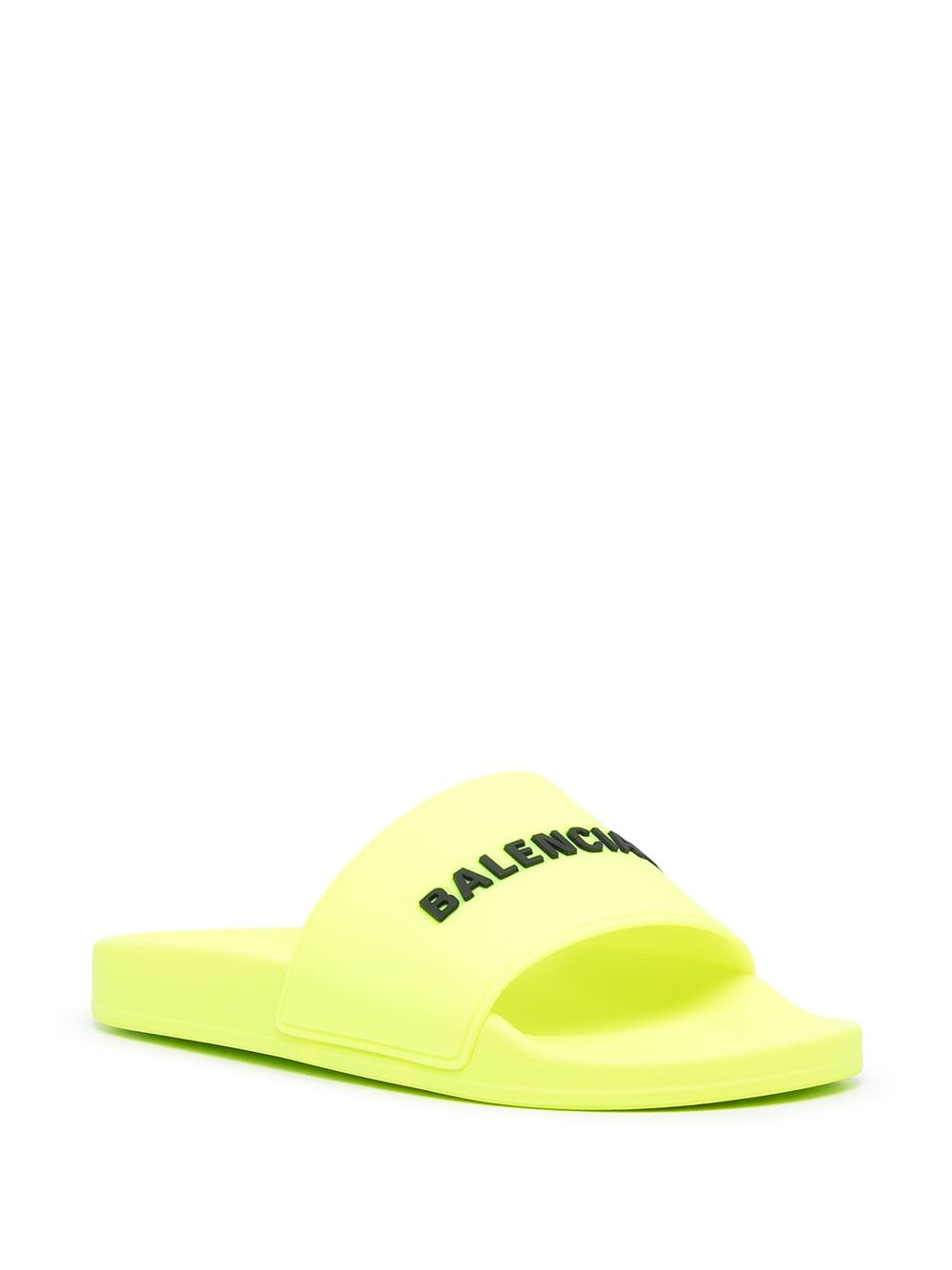 Shop Balenciaga Logo-print Rubber Sliders In Gelb