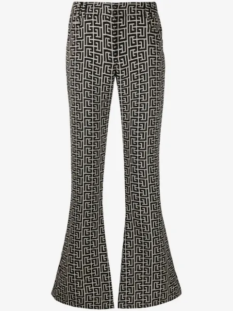 Balmain low-rise monogram bootcut trousers
