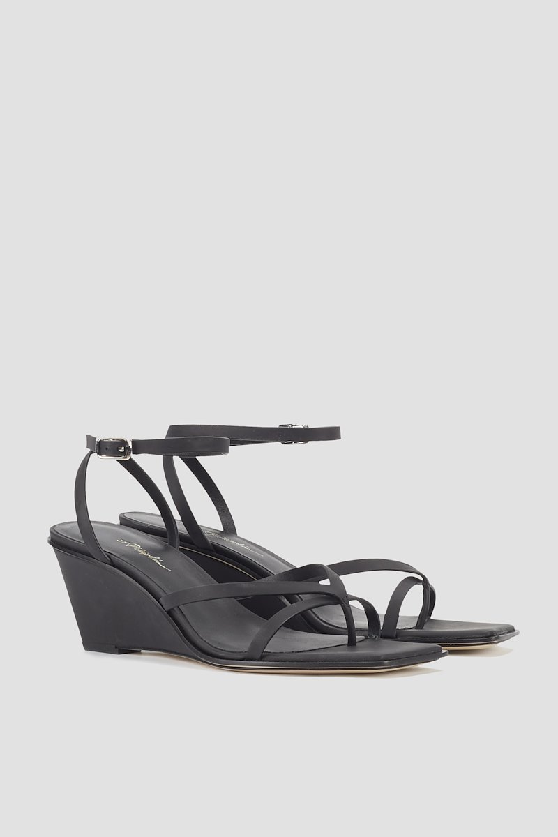 Laura Ankle Wrap Wedge Sandal-black #1 Laura Ankle Wrap Wedge Sandal, Black leather strap-detail wedge-heel sandals from 3.1 PHILLIP LIM featuring tonal design, open toe, strap detailing, buckle-fastening ankle strap and wedge heel.- 1