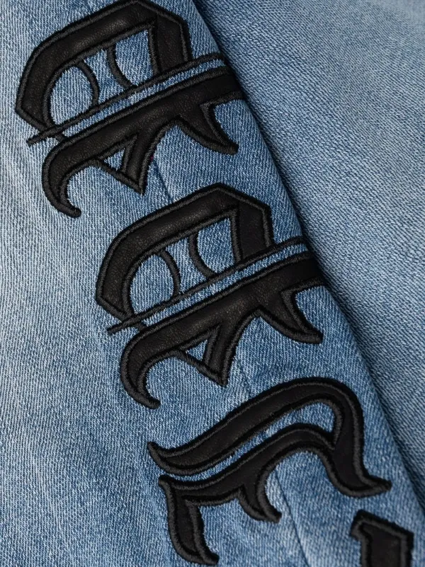 Shop Philipp Plein logo-print straight-cut jeans with Express ...