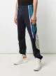Martine Rose pantalon de jogging à rayures latérales